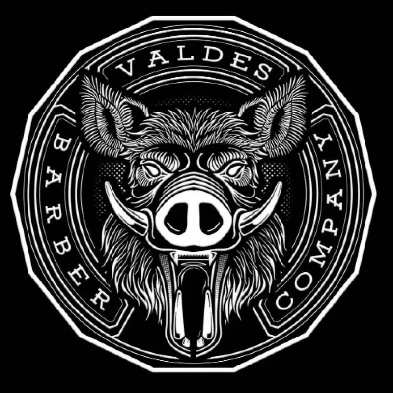 Logo de Valdés barber company